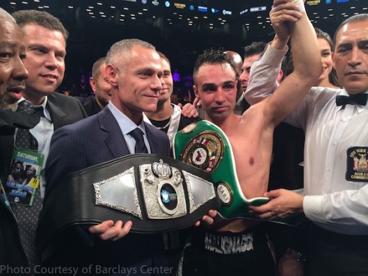 12255689-brett-yormark-awarding-brooklyns-world-champion-belt-to-paul-malignaggi.jpg