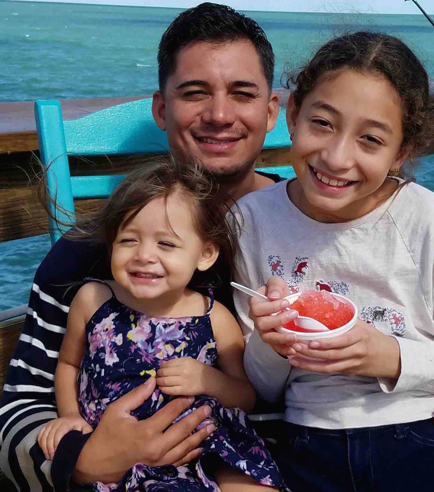 Staff Sgt Select Bolanos with daughters