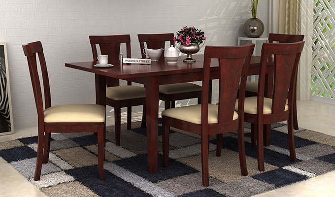 Check out beautiful collection of 6 seater dining table sets at Wooden