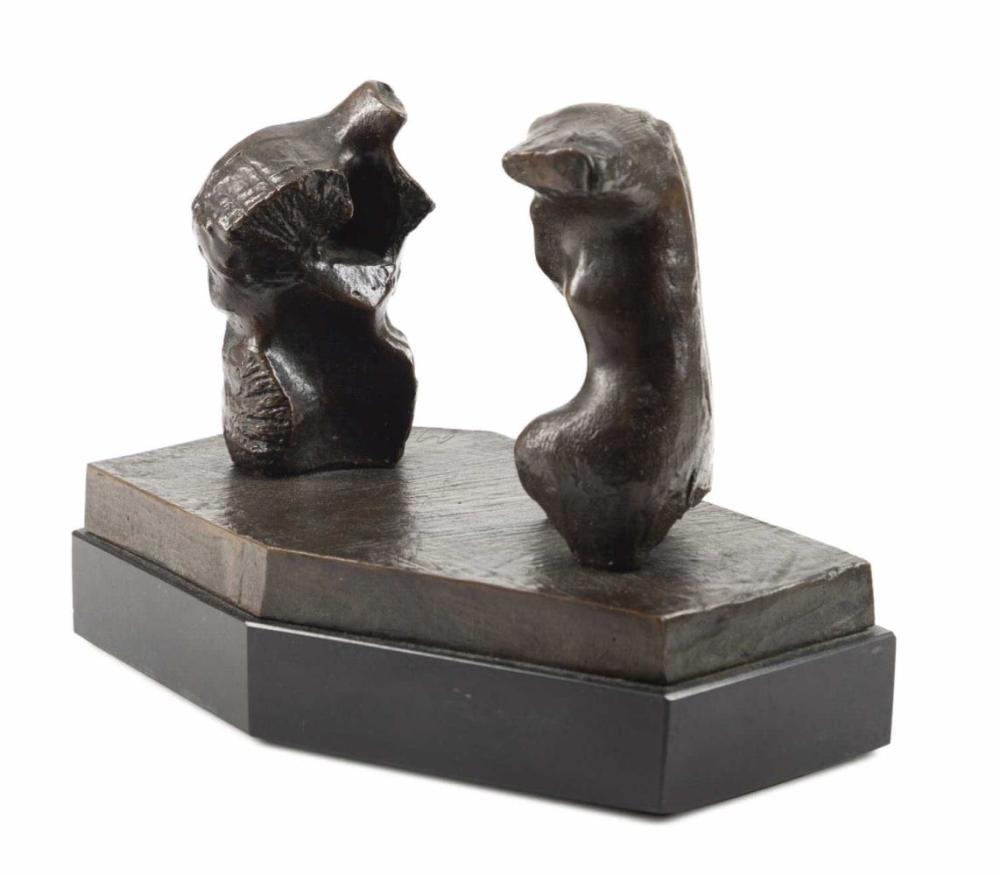 Bronze sculpture on a marble base by Henry Moore.
