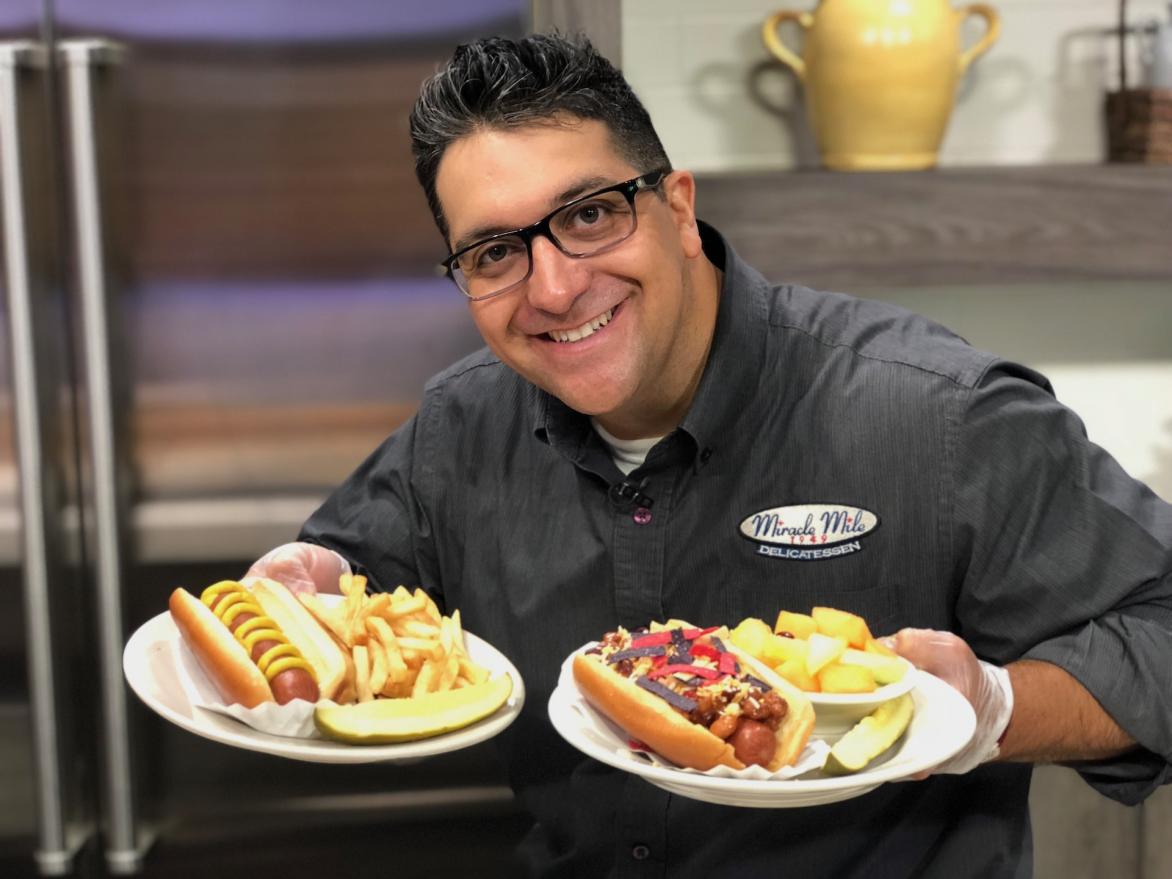 Josh Garcia with Hot Dogs